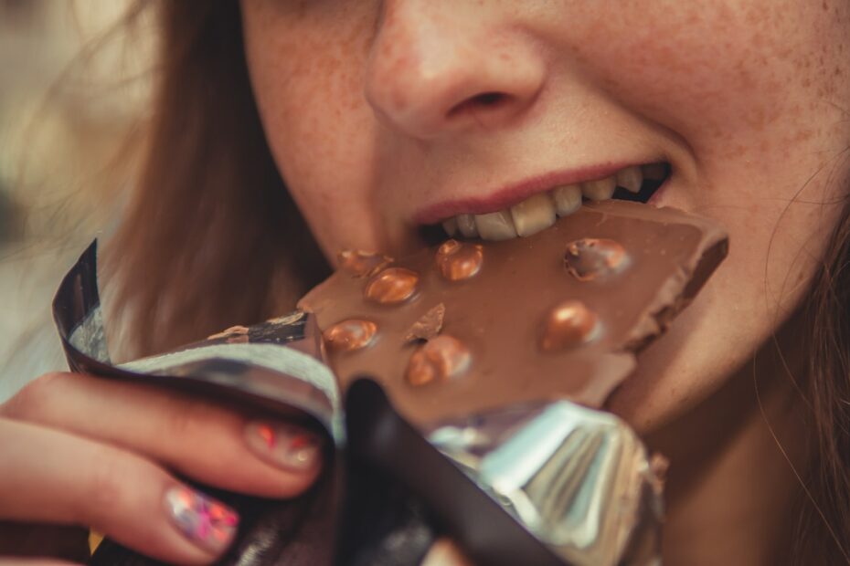 woman eating chocolate