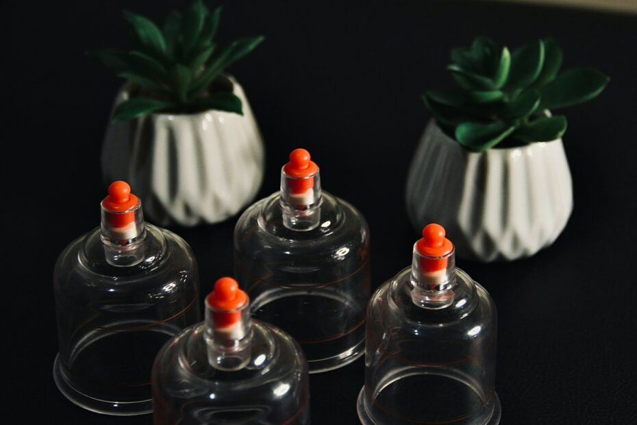 red and white bottles on black table